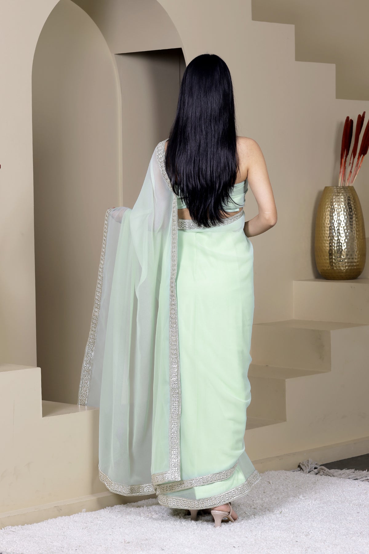 Suhani Pista Green Georgette Saree
