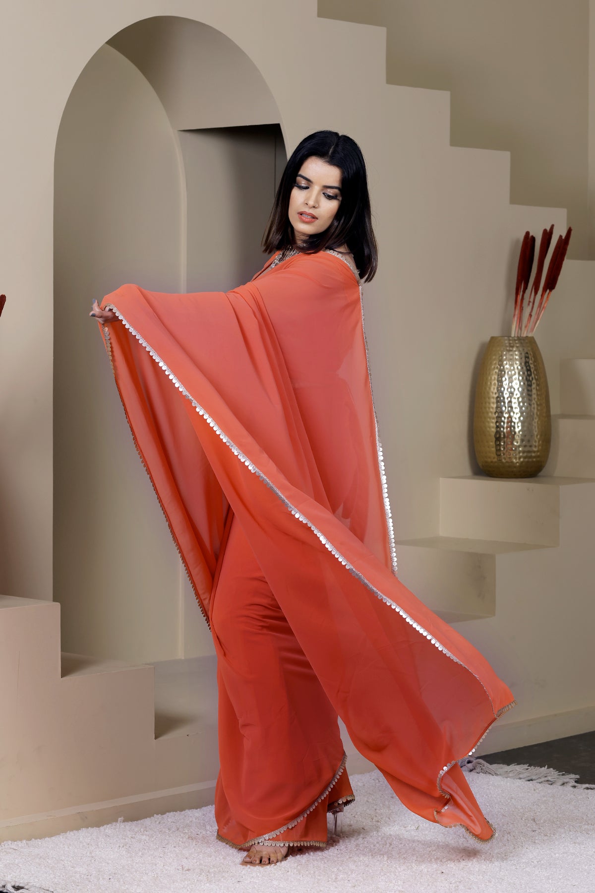 Suhani Orange Georgette Saree